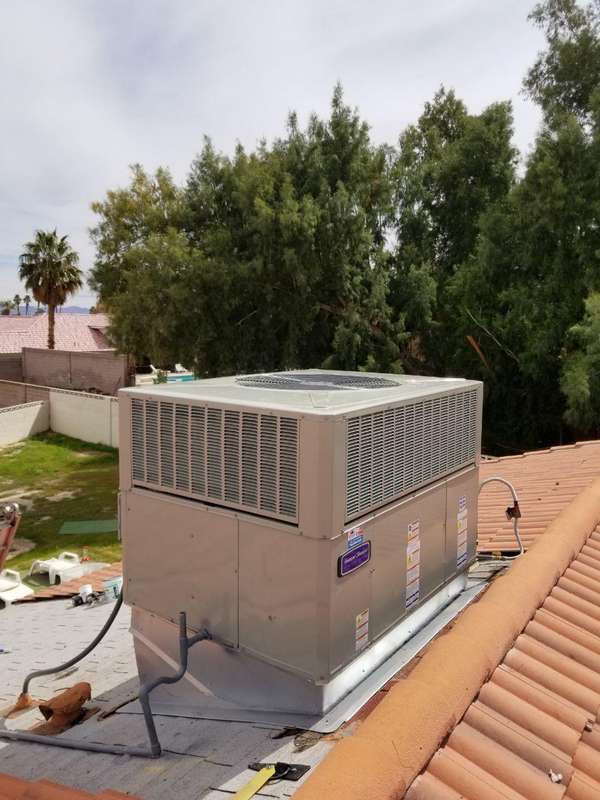 Installation of 5 ton 14 seer American standard package unit with adjustable curb After
