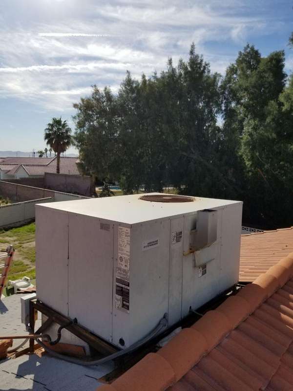 Installation of 5 ton 14 seer American standard package unit with adjustable curb Before