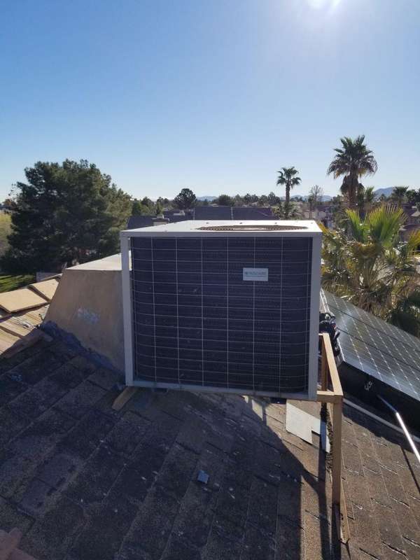 Installation of a 5ton American standard 14 seer package heat pump with adjustable curb Before