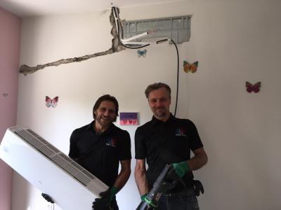 NRS Heating & Air Conditioning technicians - ready to install a new Ductless AC Unit.
