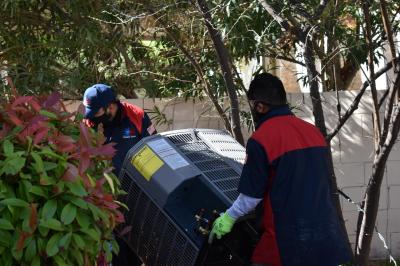 AC Replacement in Summerlin, Las Vegas - NRS team is about to install a new AC unit instead of an old one